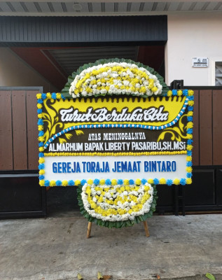 Papan Bunga Duka di Warureja